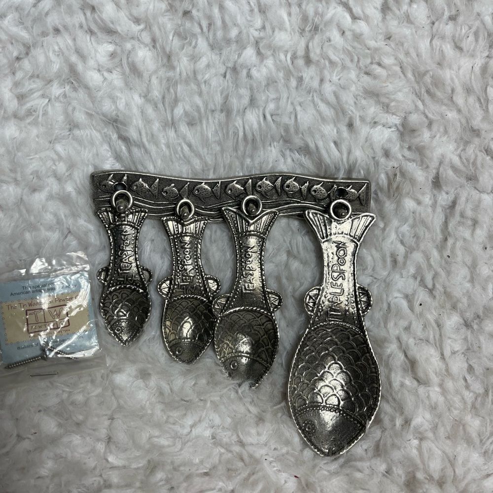 Vintage Tin Woodsman TWpewter set of four Fish measuring spoons with wall hanger